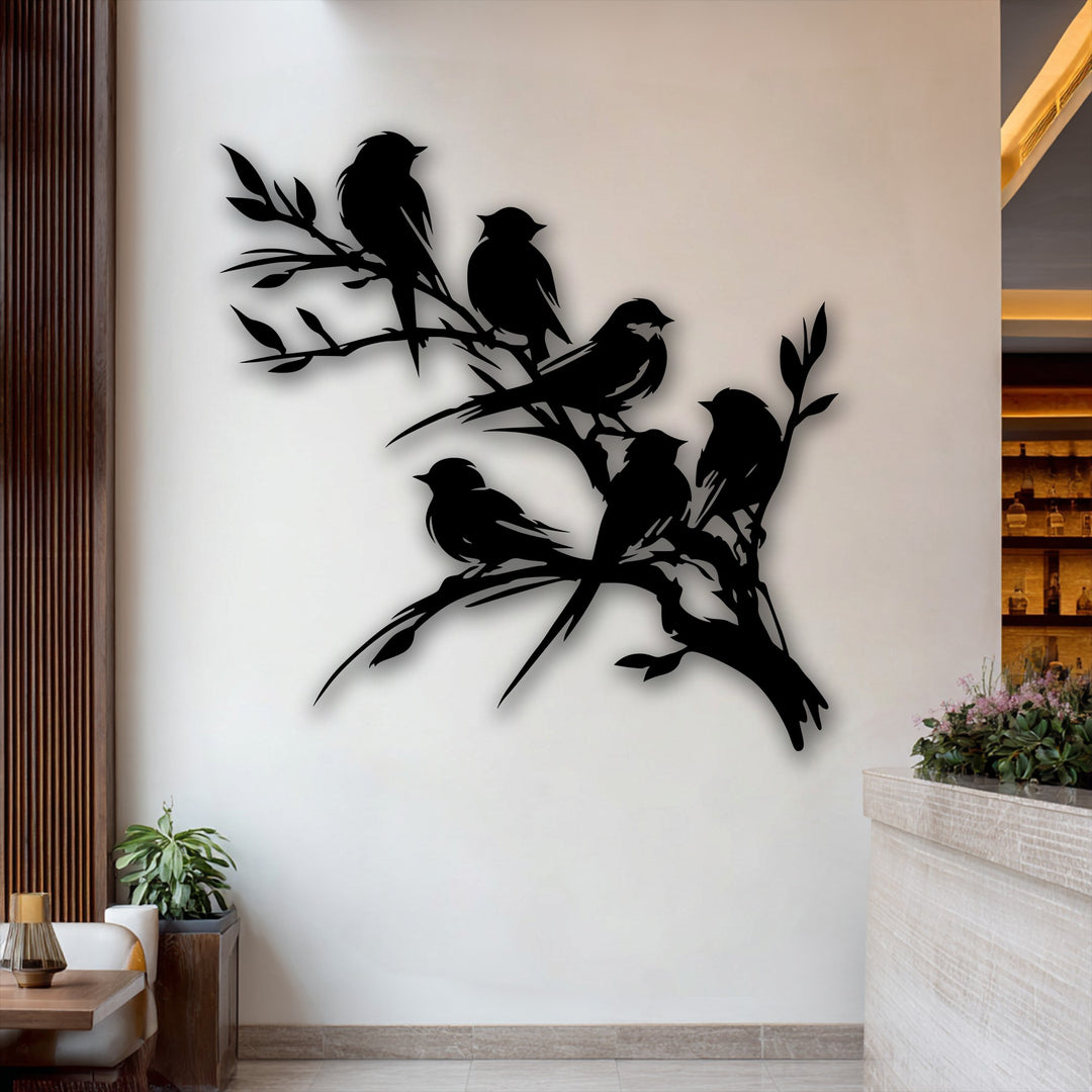 The stillness of several silhouette birds on branch decorative metal art creates a tranquil scene, elegantly perched and casting a soft shadow.