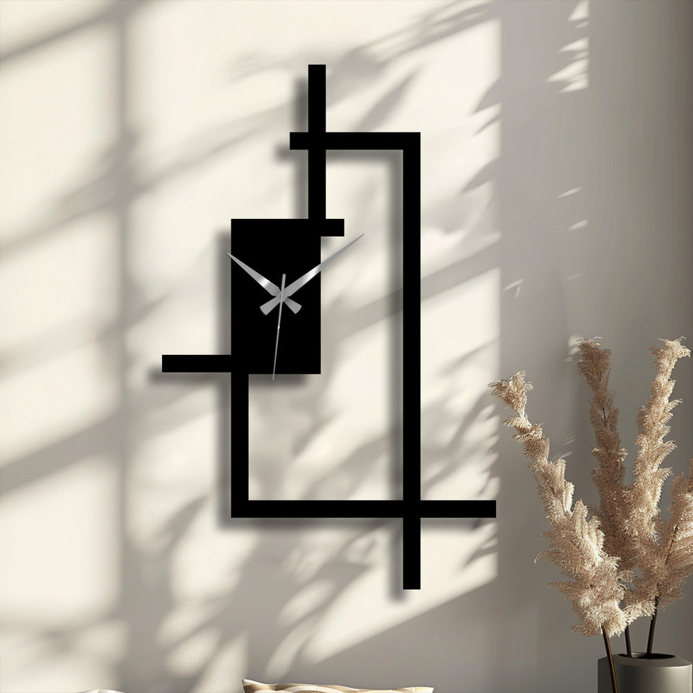 Soft light dances around the abstract lines of this metal wall clock, contrasting with the geometric metal wall decor for an organic form.