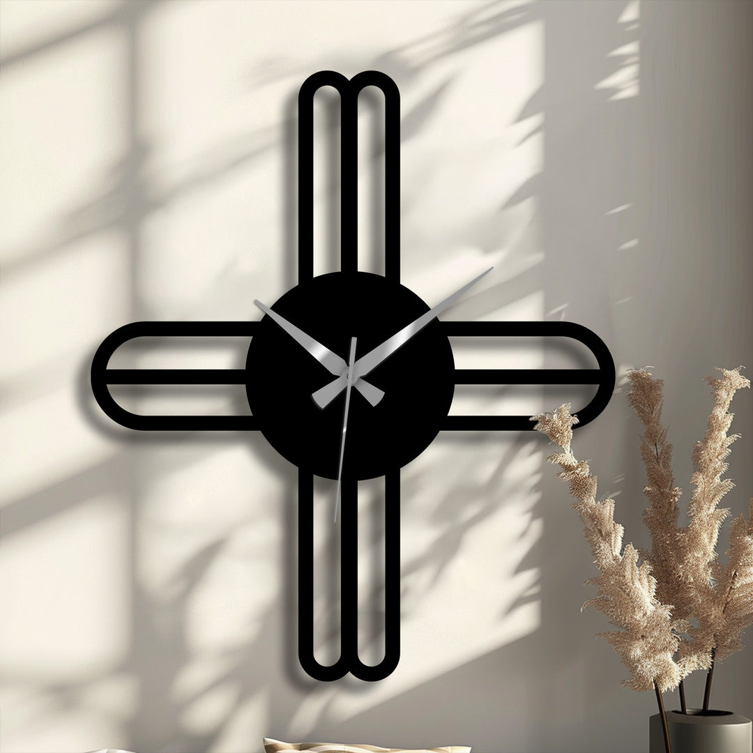 In the stillness, a minimalist cross line metal wall clock presents as decorative metal art, its shadow adding a quiet depth to the simple design.
