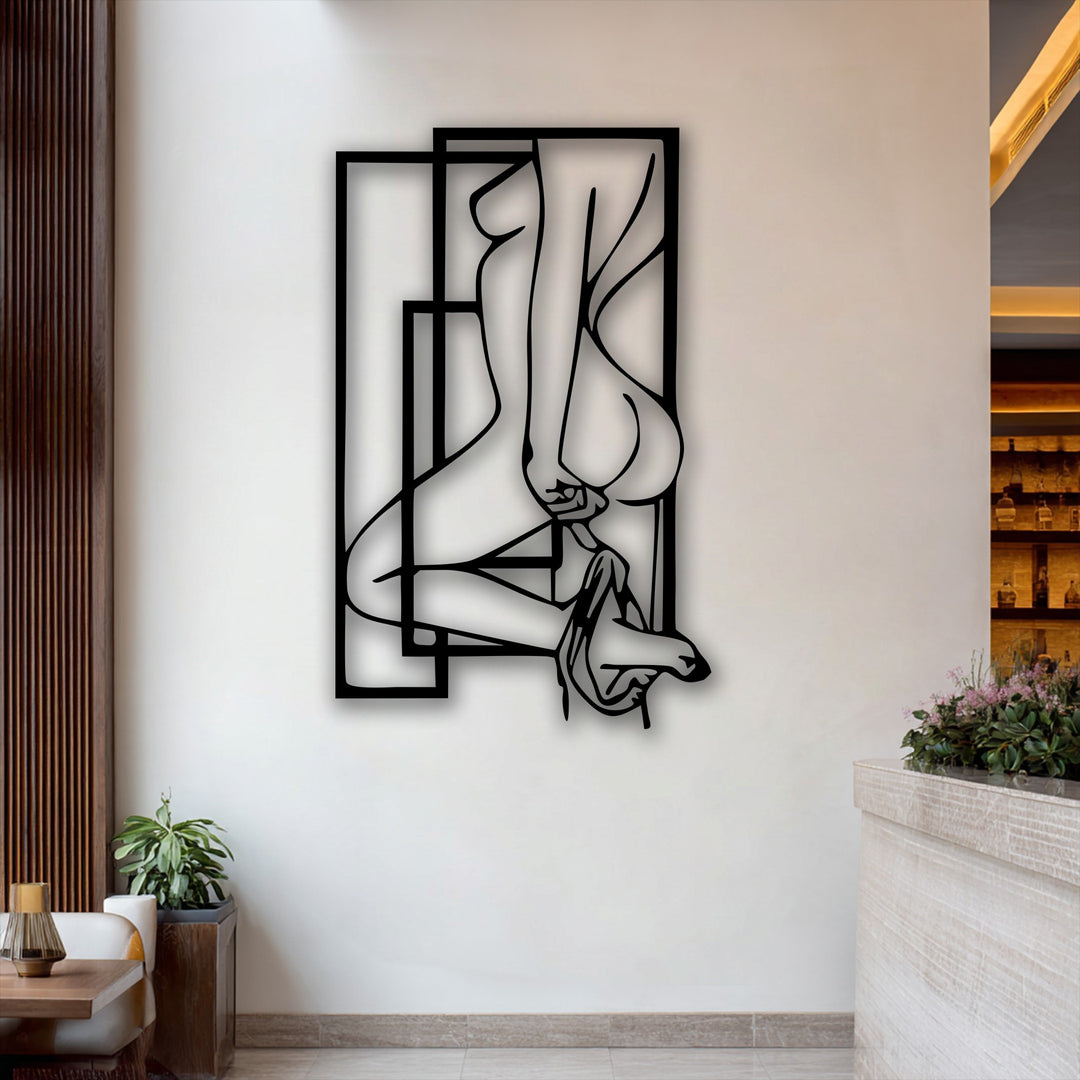 A vertically oriented abstract feminine silhouette metal decoration wall art features a nude figure outlined within modern geometric frames.