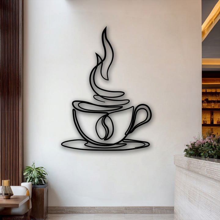 A stylized black coffee cup line art, featuring swirling steam and a distinct coffee bean, as elegant metal artwork.
