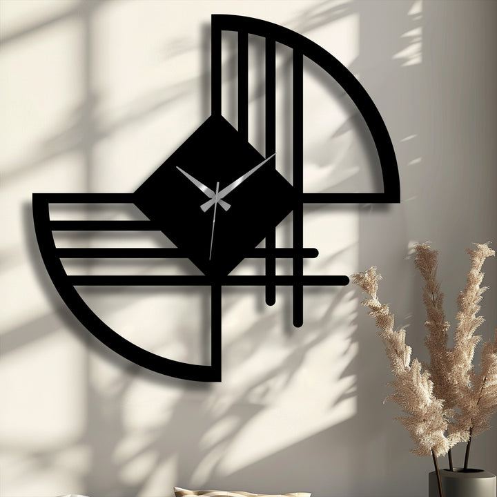 Expertly crafted metal artwork, this abstract geometric wall clock showcases exceptional material quality with its sleek matte black finish.