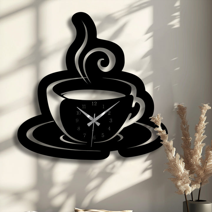 The gentle wisps of steam from the coffee cup metal artwork wall clock softly complement the delicate dried plant elements.