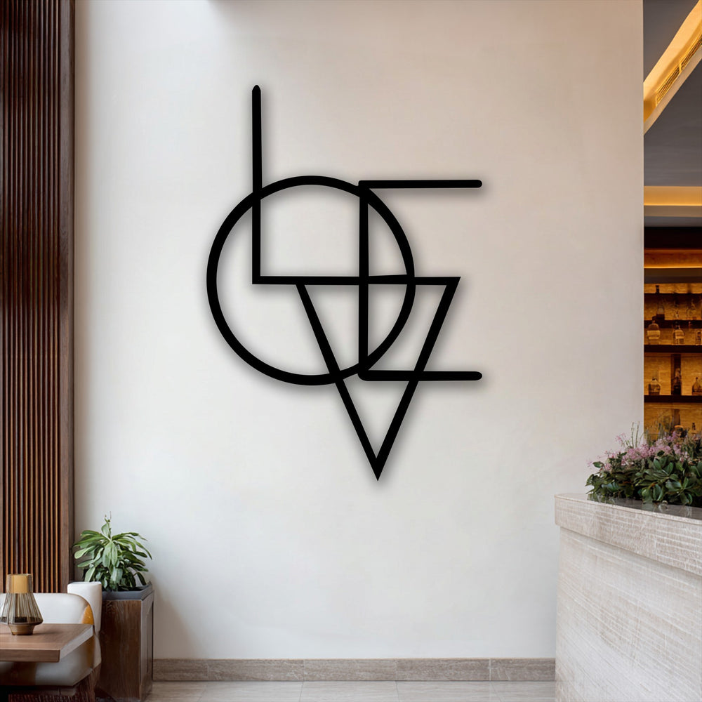 The bold abstract geometry fusion, a modern minimal metal wall decor, commands attention on the bright white wall.