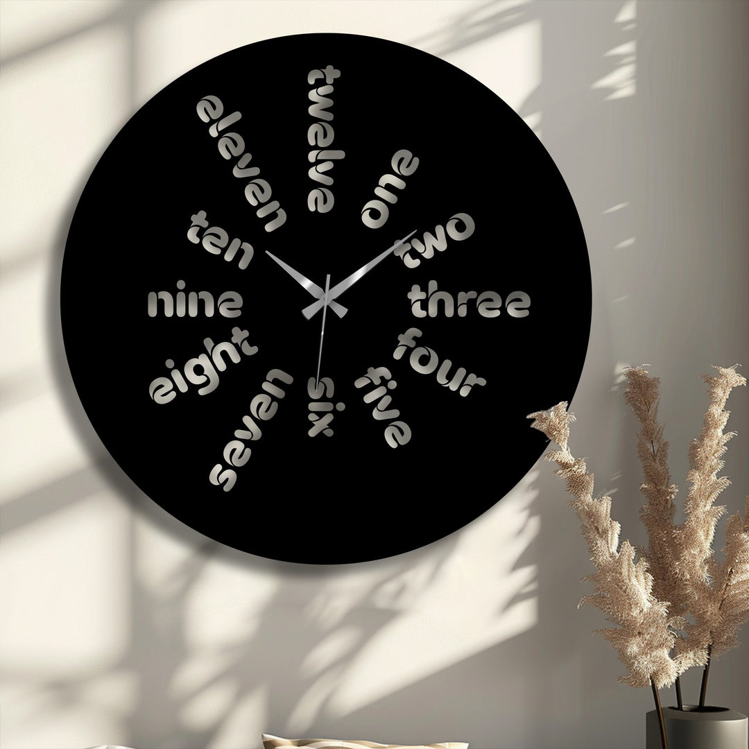 The stillness of time is captured in this modern typography design of the Word Time metal art for wall clock, its silver hands poised above the word numerals.