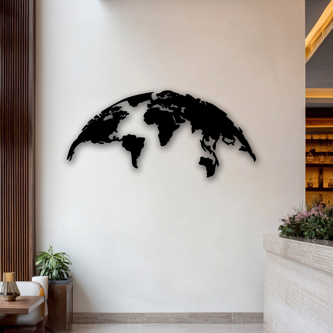 Showcasing realistic detail, this world map decorative metal art features a crisp black silhouette casting a subtle shadow against the bright wall.