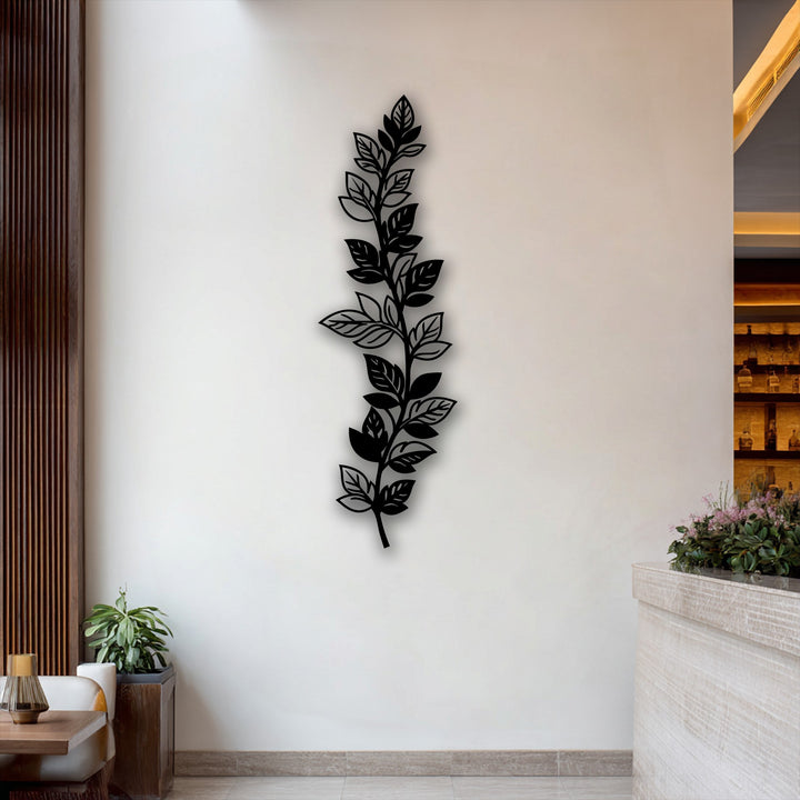 The serene mood of this modern interior is enhanced by the elegant botanical leaf branch metal art for wall, complementing the natural elements.