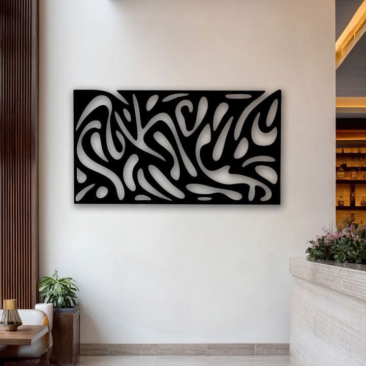 The sharp edges of the abstract fluid pattern metal art for wall create a striking contrast against the pale background, bordered by a textured wooden panel.