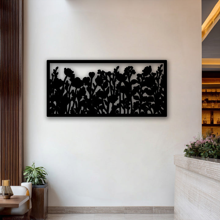 Gracefully swaying wildflowers in this decorative metal art piece convey a subtle botanical movement, enhancing the modern garden design.