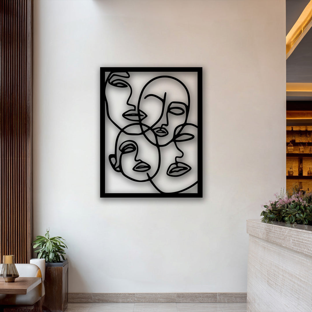 The premium metal art for wall features exquisite abstract faces line art, showcasing superior material quality and intricate design.