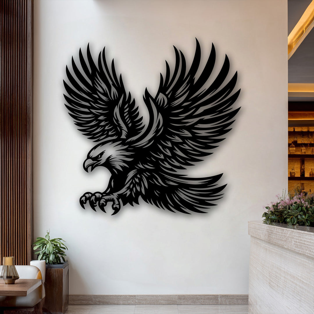 Stark color contrast highlights the majestic black flying eagle metal art for wall with intricate detailing against a bright, light-colored background.