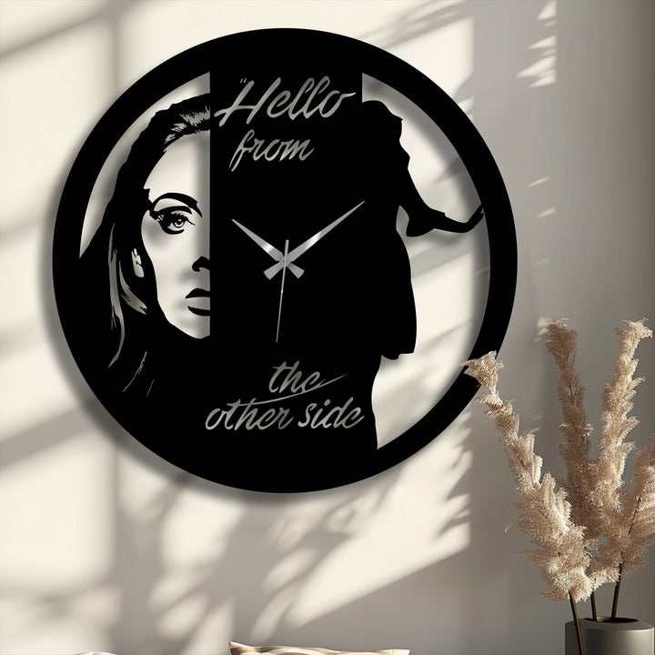 Showcasing the realistic detail of the artistic portrait design, this dual-faced metal wall decor clock features a striking silhouette and precise metalwork.