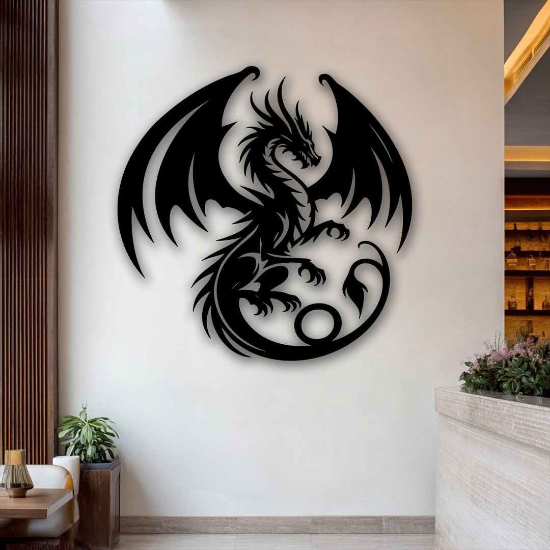 The dramatic color contrast highlights the fierce black dragon metal artwork against the bright white wall, featuring majestic spread wings.