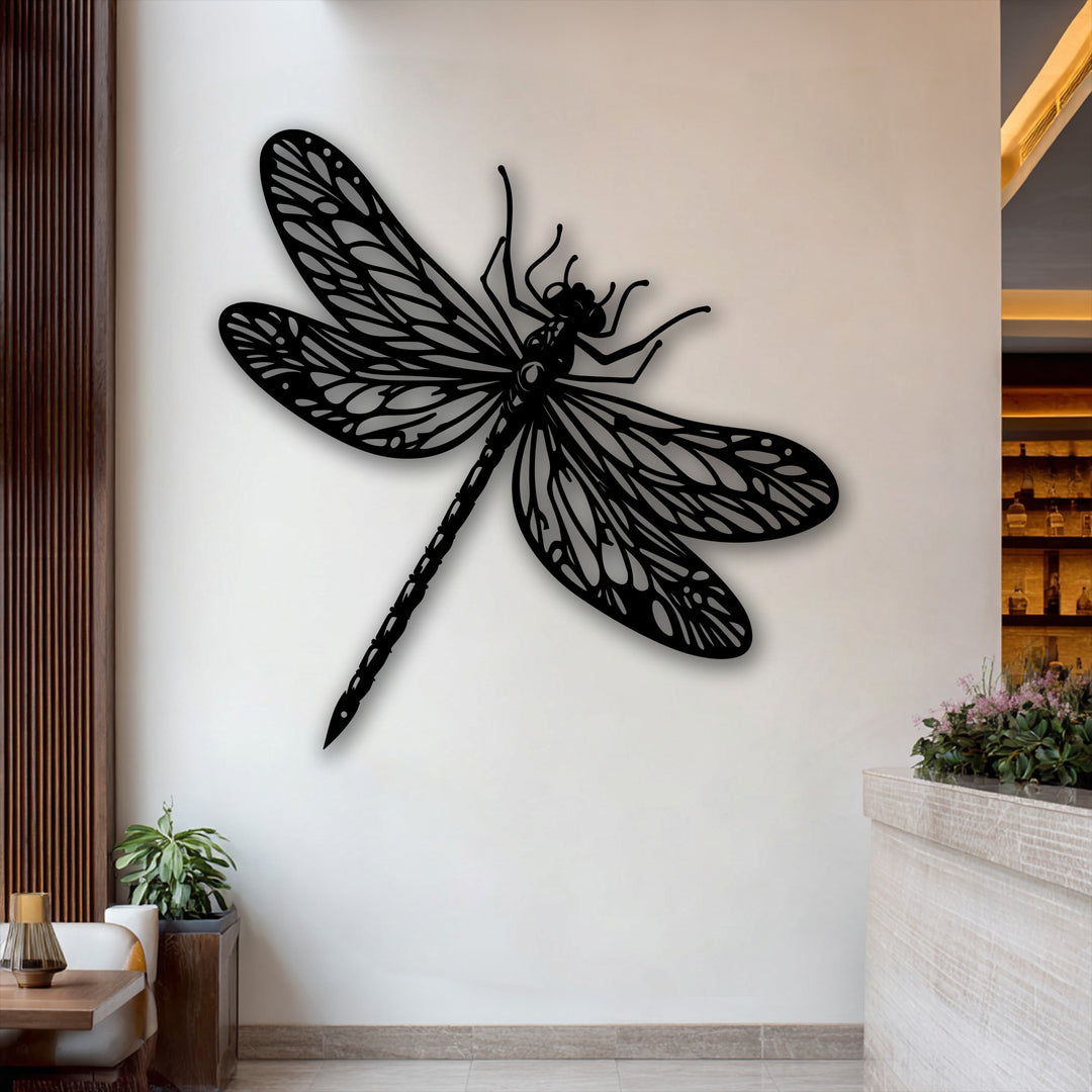 Striking color contrast highlights the elegant black dragonfly metal art for wall against the bright, minimalist background.