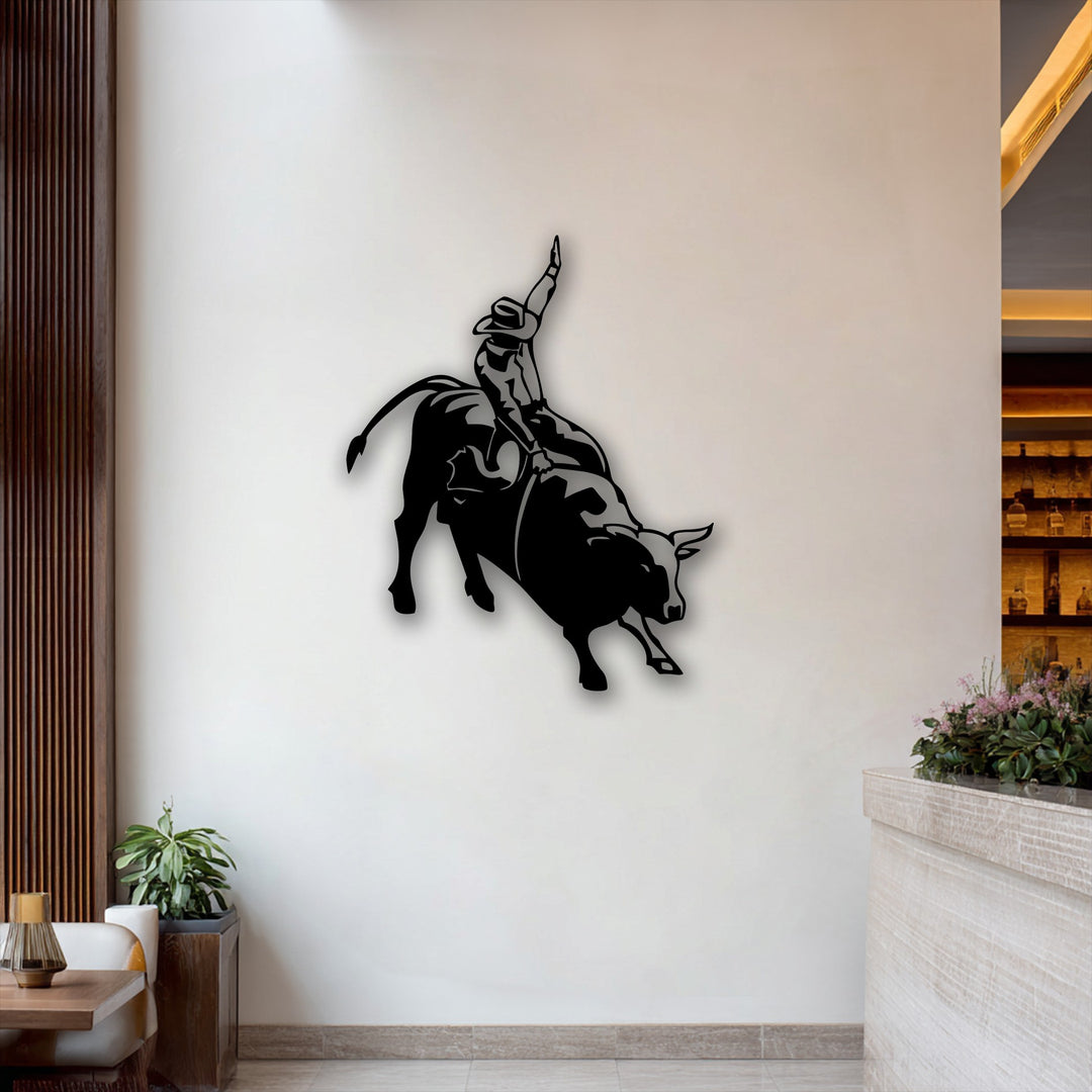 A delicate arrangement of pink and green flowers adorns the light-toned bar, contrasting with the bold rodeo cowboy metal wall decor.