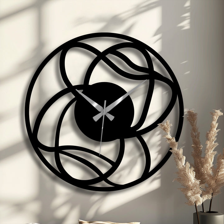 black and gold metal wall clock