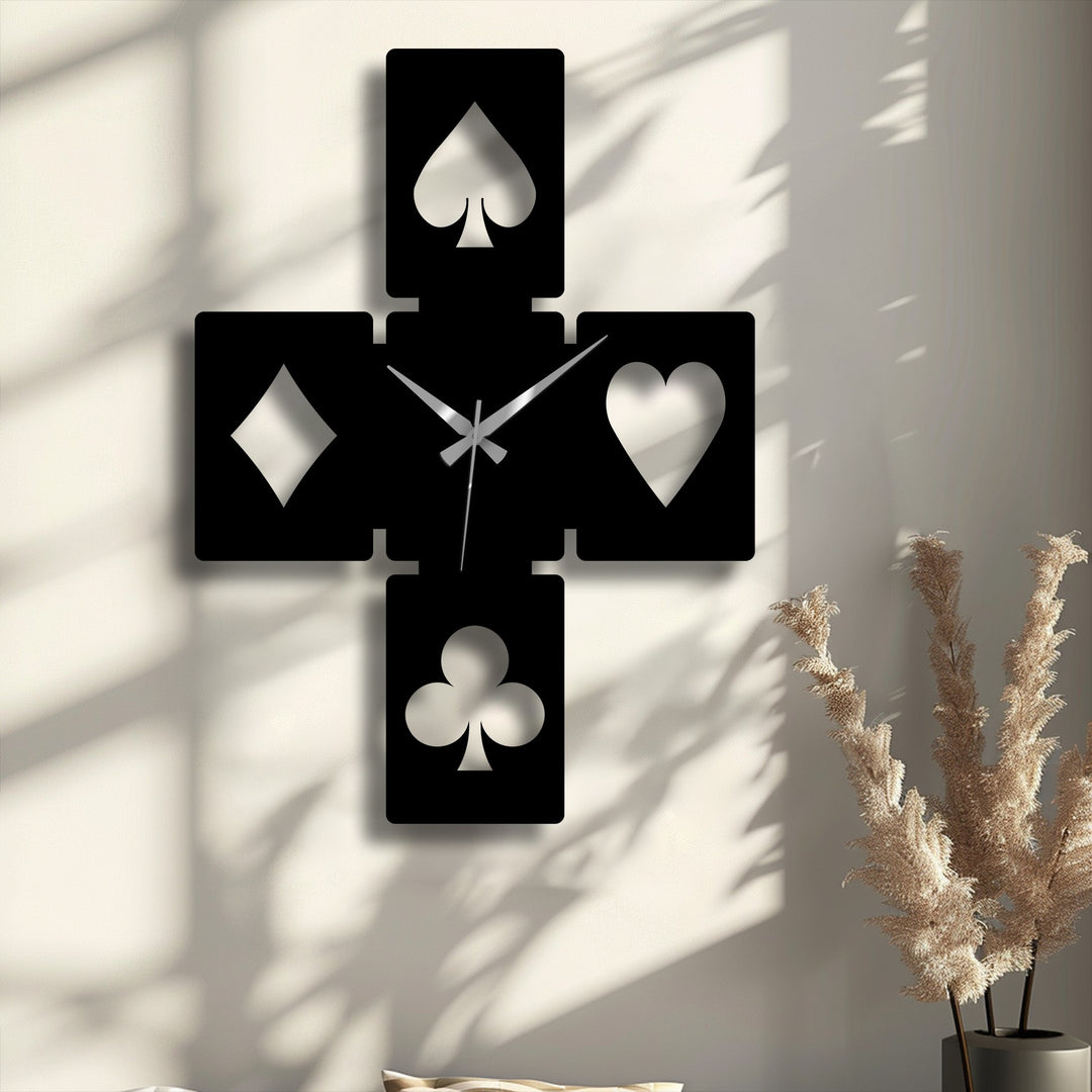 Geometric playing card symbols form a striking metal wall clock, a unique piece of decoration wall art with a modern design.