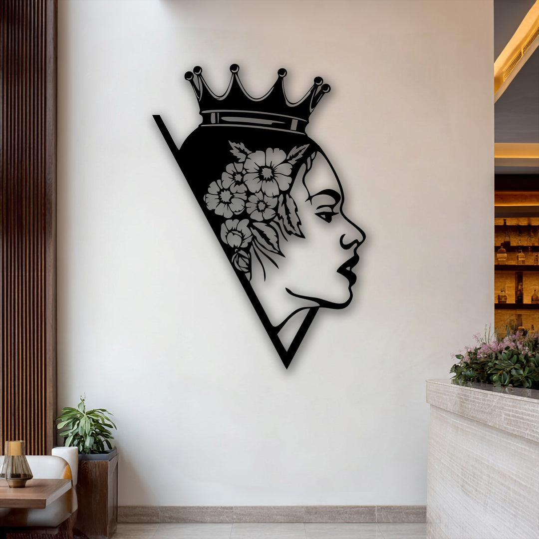 The striking color contrast highlights the black Floral Queen Silhouette decorative metal art against a bright white wall, creating an elegant visual.