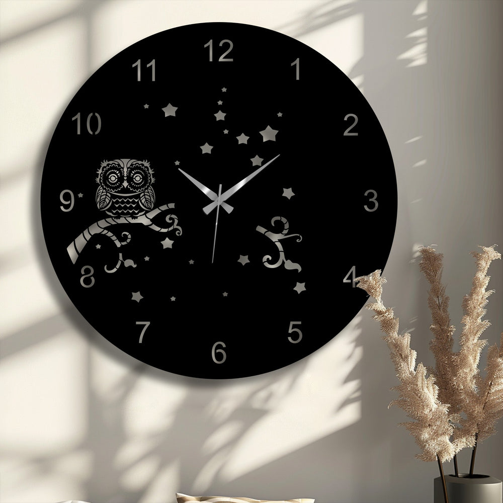 Soft light creates intricate shadows on the wall around the Owl Night Metal Wall Clock, highlighting its decorative metal art and starry sky design.