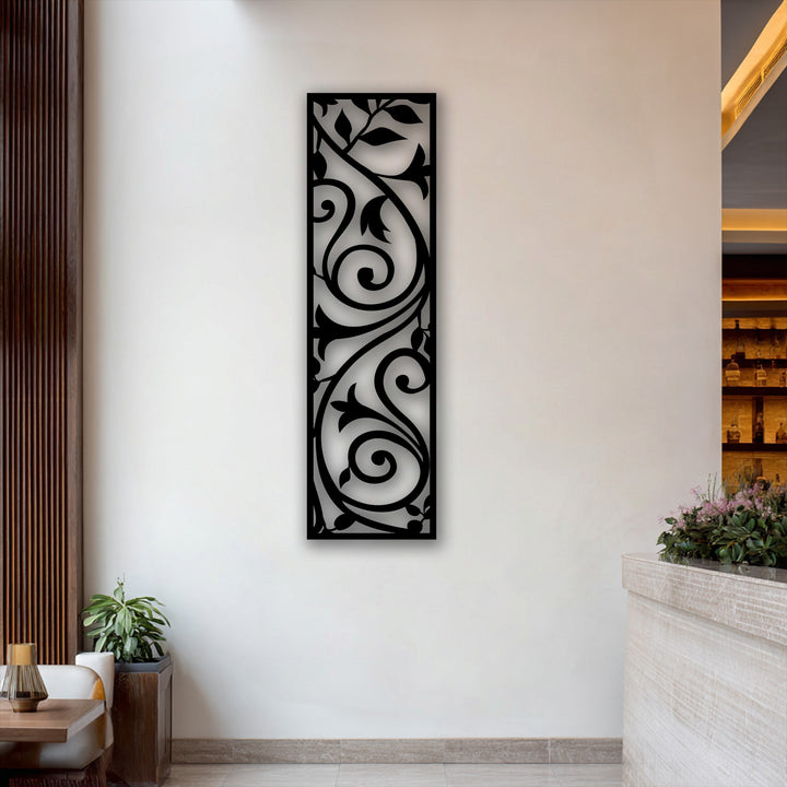 The graceful curves and ascending leaves of this black vertical scroll vine metal wall decor evoke a profound sense of movement.