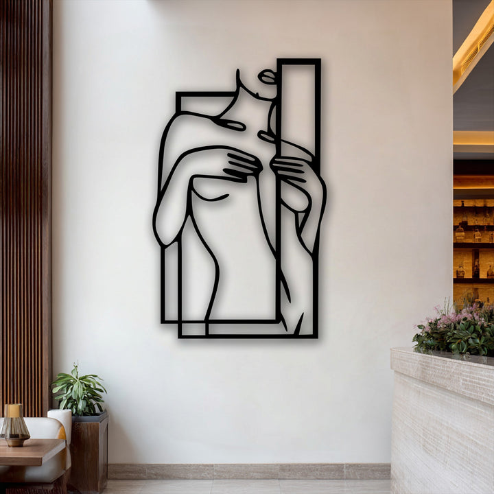 Delicately blooming pink flowers softly complement the striking minimalist female figure line art, a modern geometric decoration wall art piece.