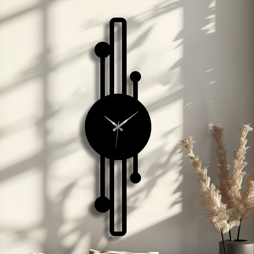 Peaceful shadows complement the vertical minimalist metal wall clock's sleek design, enhancing the home decor with a quiet, modern aesthetic.