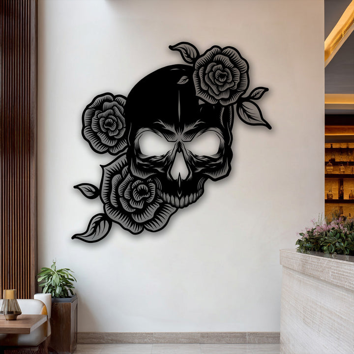A metal wall decor piece featuring layered depth, this floral skull with intricate roses creates a striking dimensional effect on the wall.