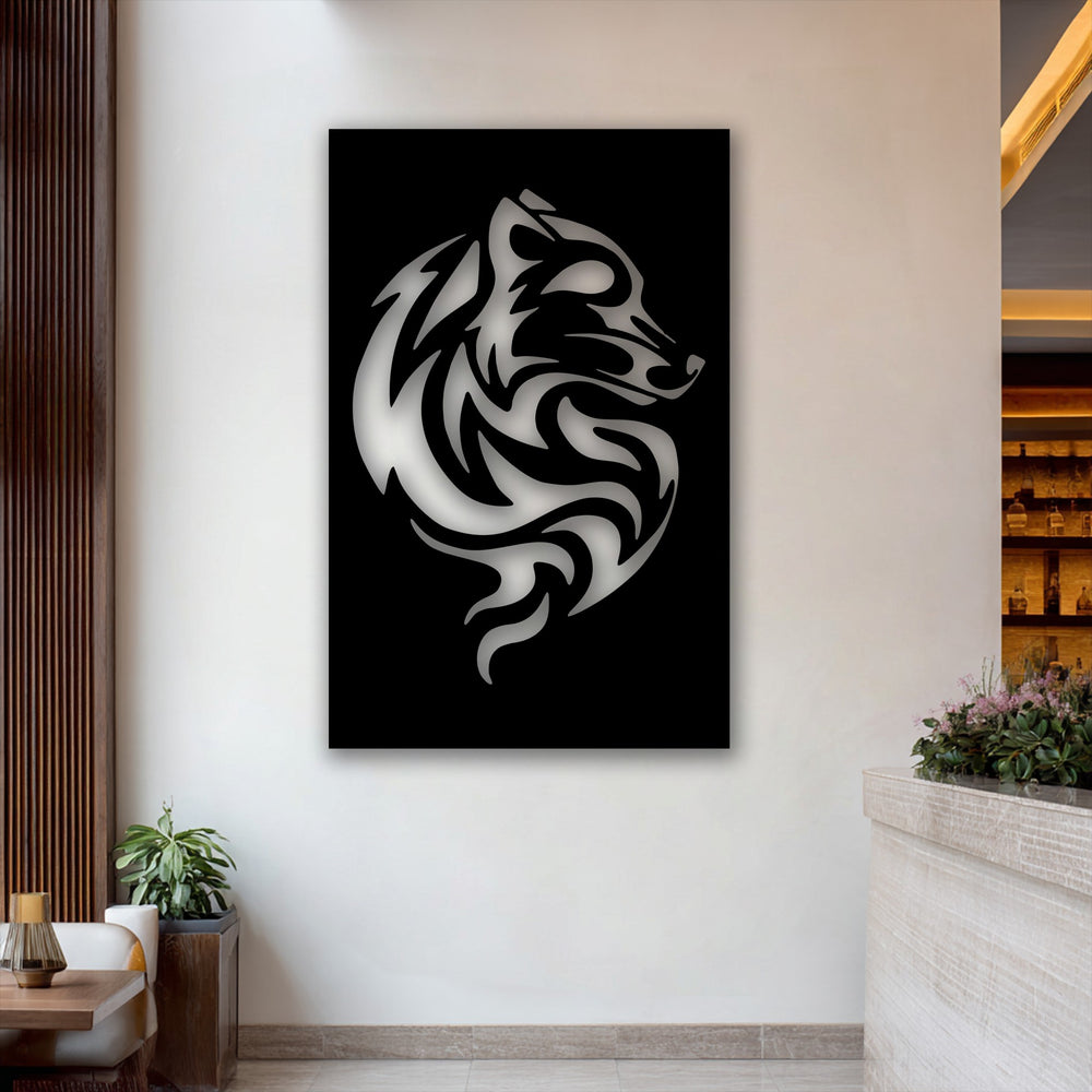 A wooden table and green plant enhance the vivid tribal wolf swirl metal decoration wall art, an abstract animal power piece.