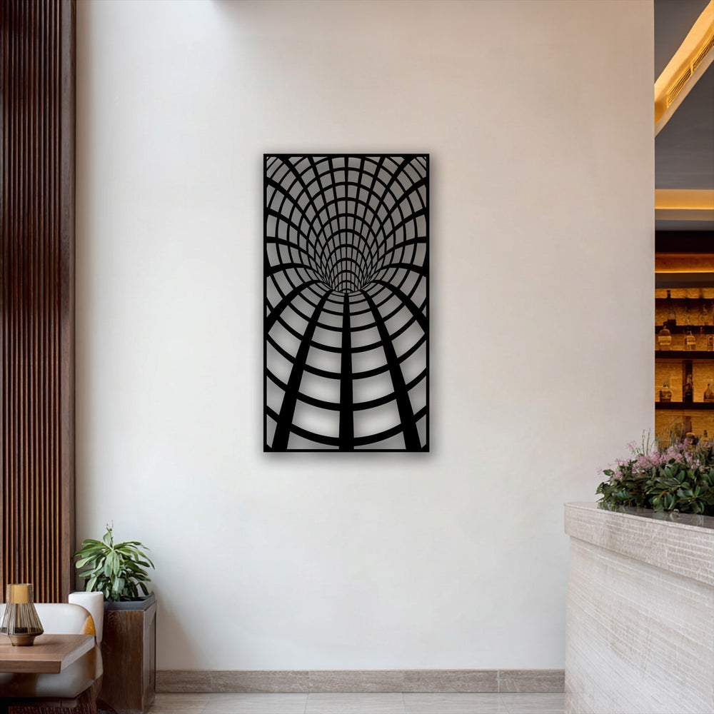 The brightest area illuminates the intricate grid design of the optical tunnel decorative metal art piece.