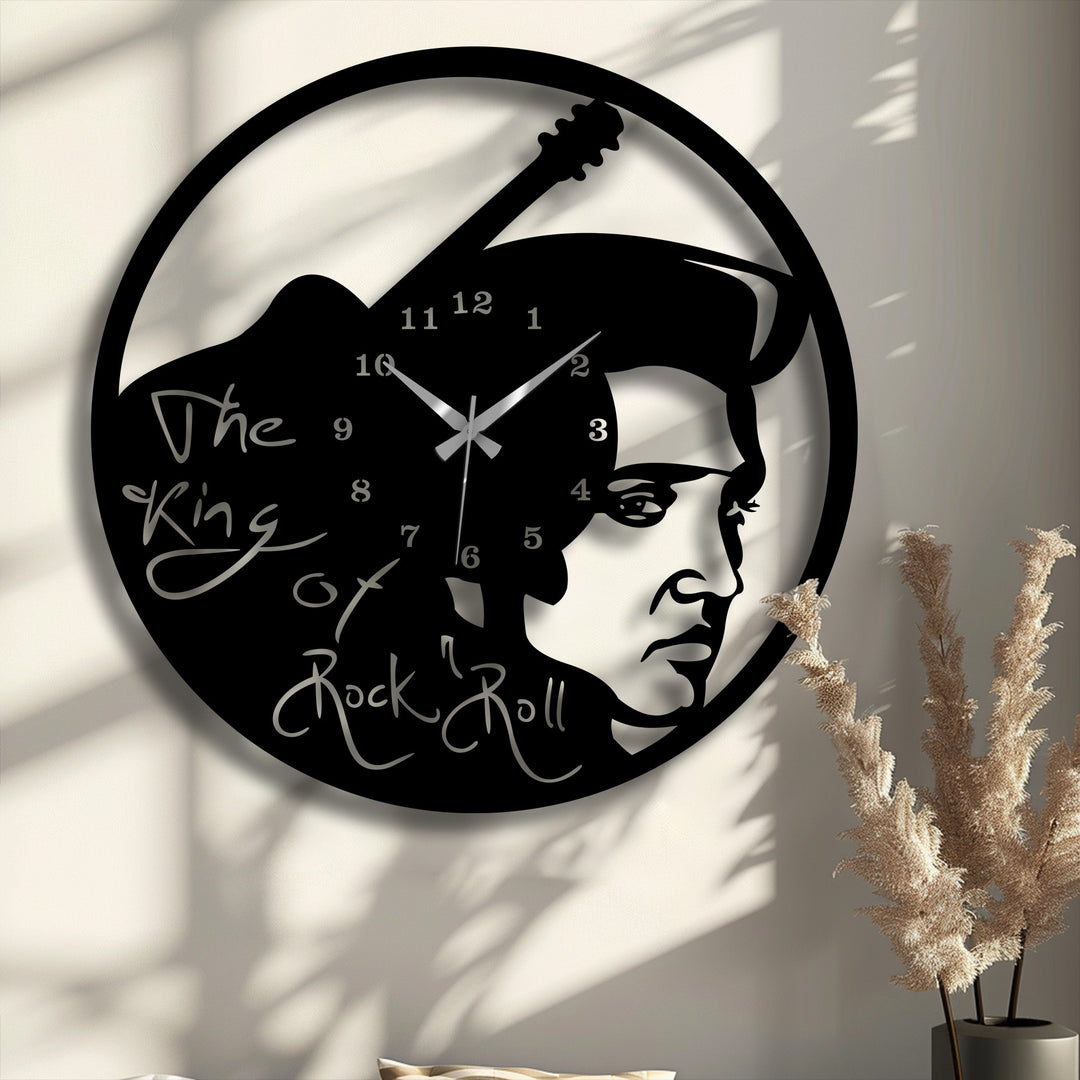 The negative space of this rock music icon metal wall decor clock strikingly defines Elvis Presley's profile and a vintage guitar, contrasting against the wall.