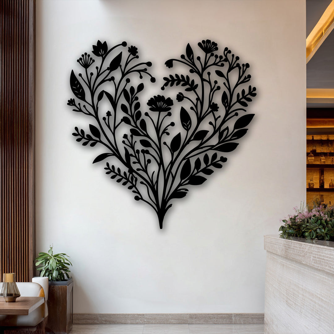 The distinct edge and borders of the unique metal wall art create a botanical heart, showcasing elegant floral and nature-inspired shapes.