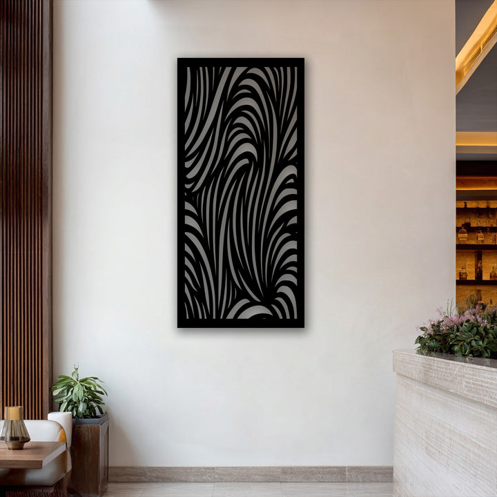 The realistic detail of the intricate, flowing grey stripes creates a dynamic abstract wave pattern on this black decorative metal art.