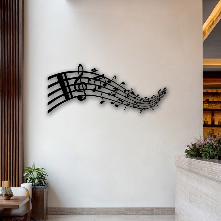 The visual rhythm of this decorative metal art displays flowing musical notes, including a treble clef, creating a harmonious melody.