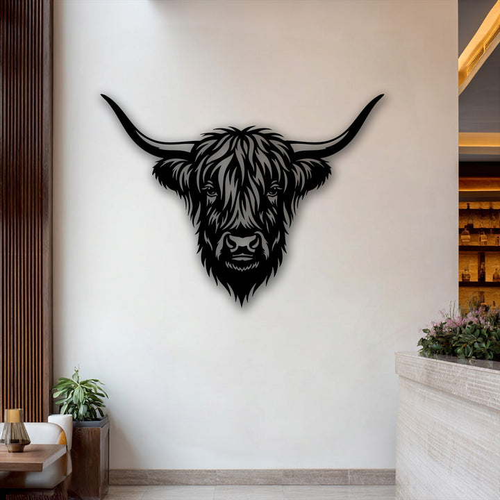 Clean lines and architectural borders define the room, framing the captivating Majestic Highland Bull Head metal art for wall.