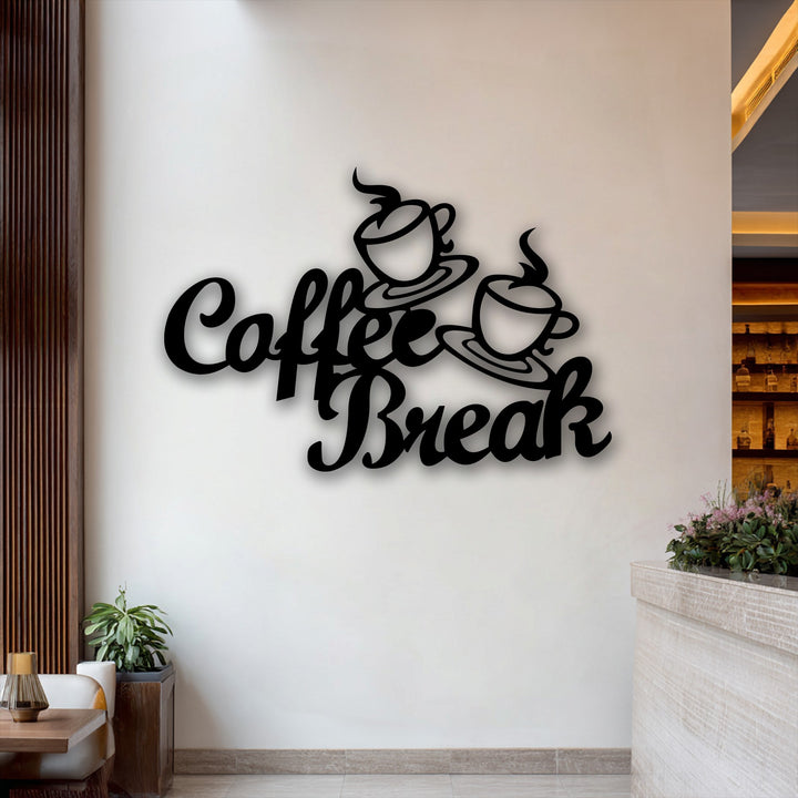 The bold 'Coffee Break' unique metal wall art with two steaming cups is the most striking element on the bright white wall.