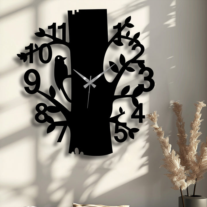 Subtle shadows accentuate the forest bird metal wall clock's nature-inspired tree design, enhancing the appeal of this unique metal wall art.