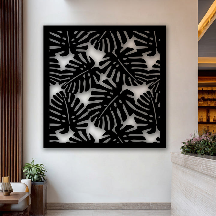 The tropical monstera leaf pattern on the modern metal decoration wall art exhibits a fluid motion, bringing a lively energy to the serene space.