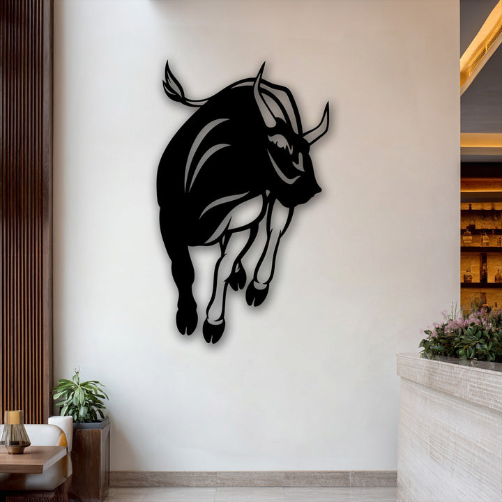 Horizontally oriented, this dynamic charging bull silhouette metal wall decor powerfully captures the sleek, muscular shape of a bull in action.