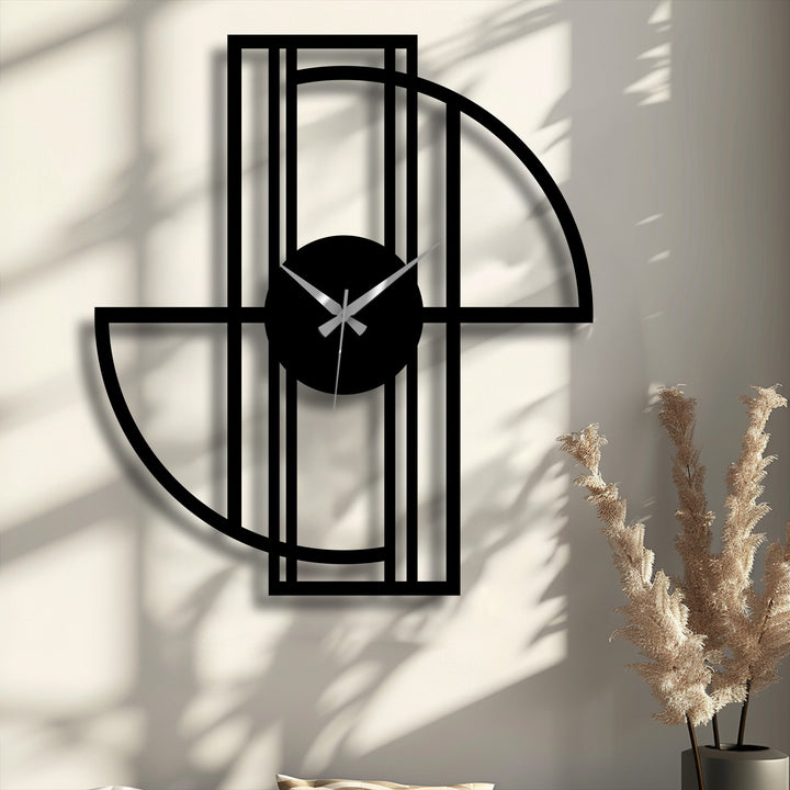 The unique metal wall art clock features a sleek, matte black finish that beautifully complements its modern geometric design.