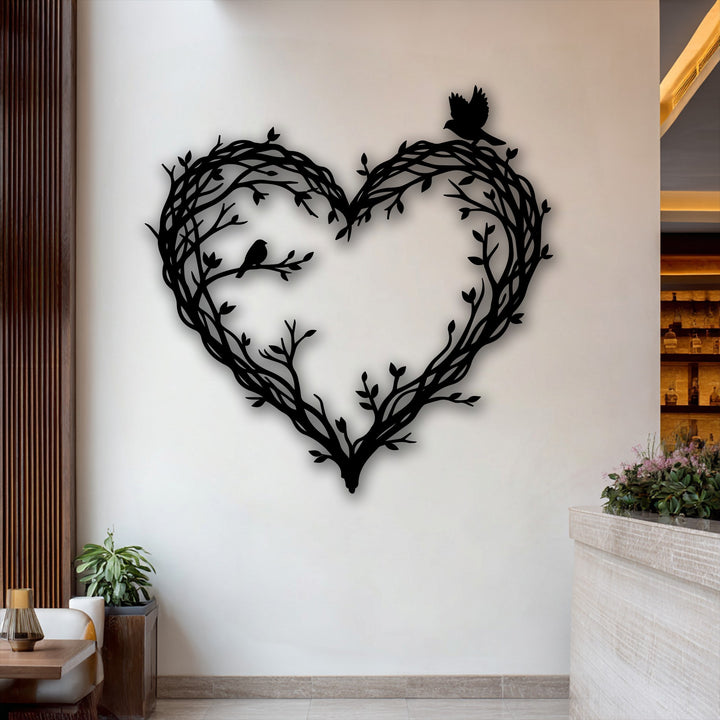 A sleek wooden table, golden lamp, and green potted plant fill the foreground, enriching the metal decoration wall art.