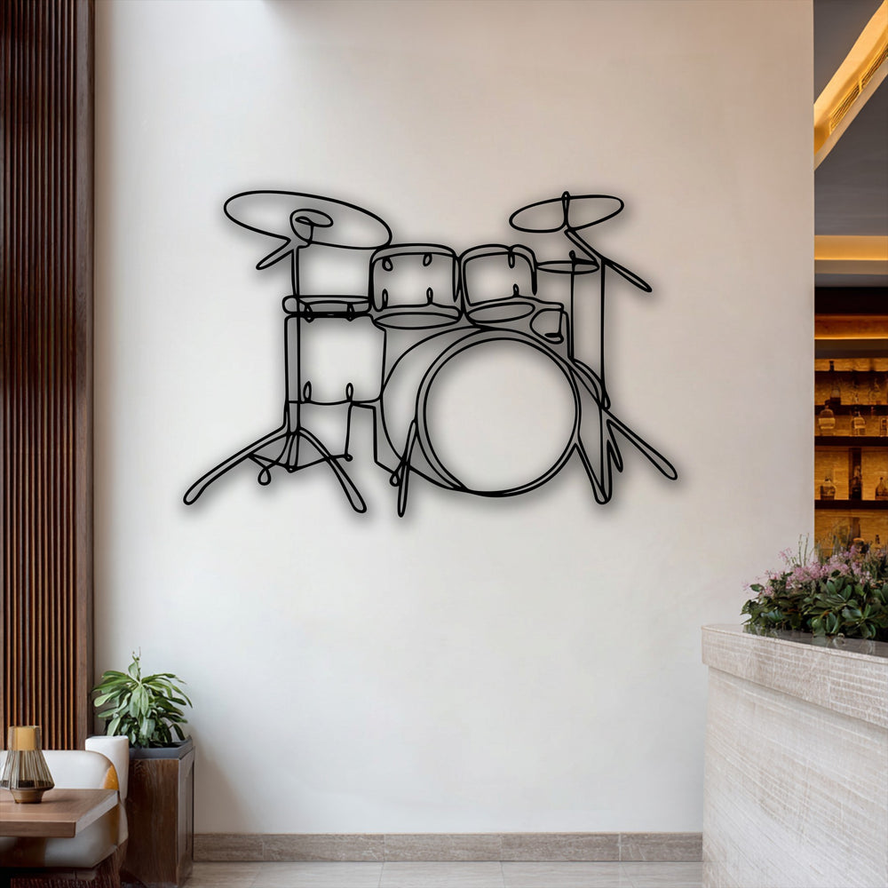 The layering effect of the black minimalist drum set decoration wall art creates depth against the smooth, light-colored wall.