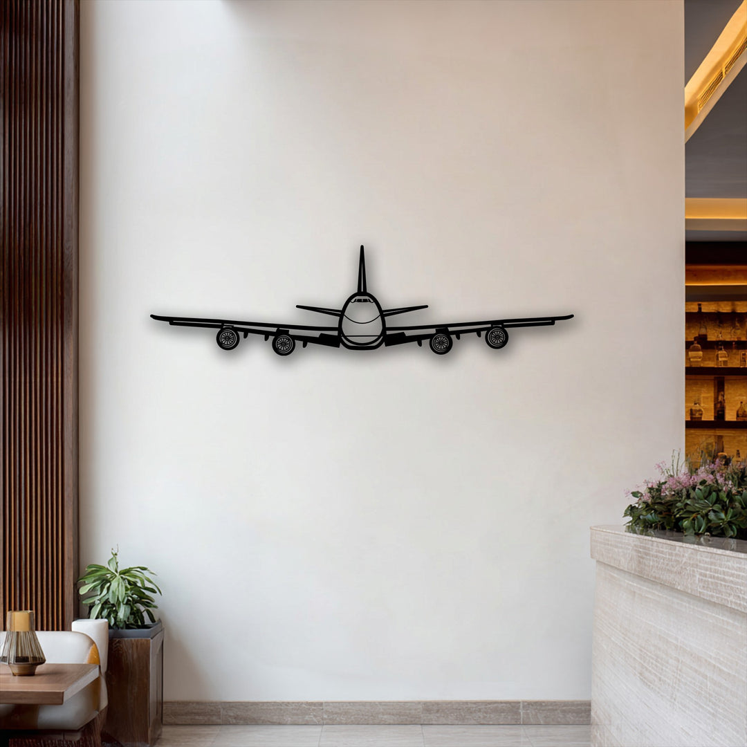 The striking focal point showcases a sleek, black airplane front view metal wall art, an eye-catching piece of aviation decoration wall art.