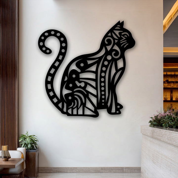 The finish of the unique metal wall art showcases a smooth matte black, highlighting its intricate laser-cut cat silhouette.