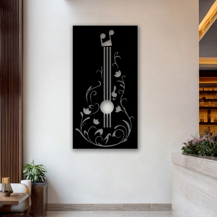 The elegant transition from bright silver to deep grey tones on the decorative metal art floral guitar creates striking visual depth.