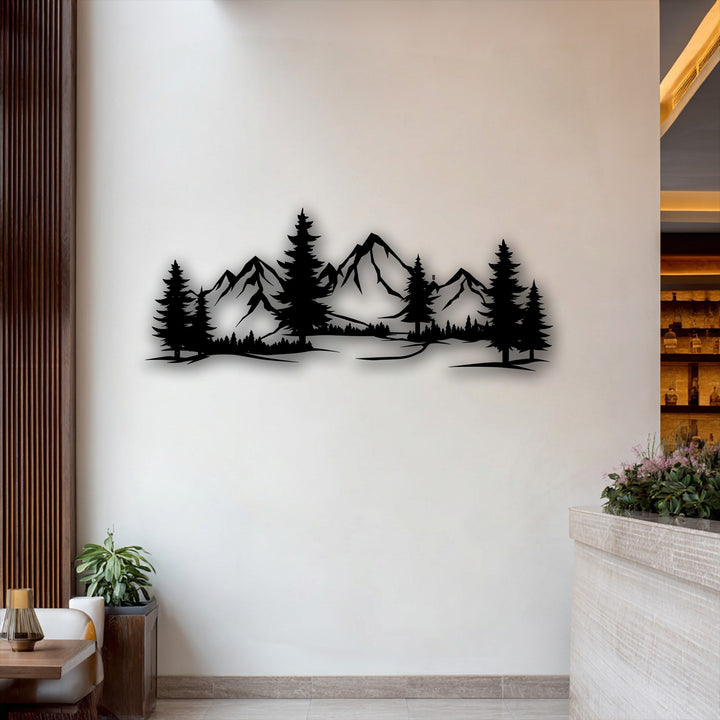 A horizontal panorama of metal art for wall, showcasing a striking mountain forest silhouette with rugged peaks and dense pines.