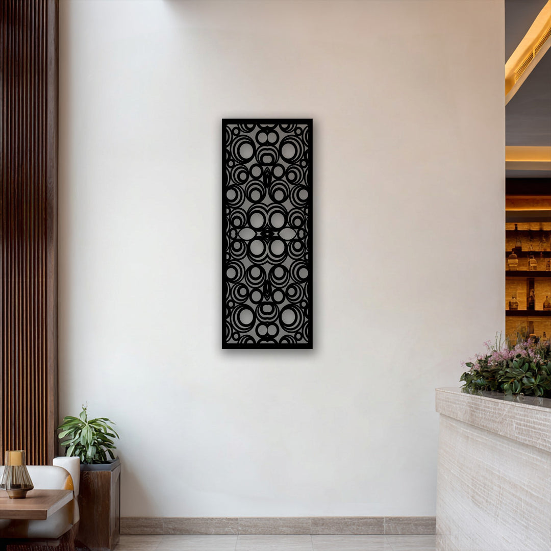 The invitingly warm color temperature highlights the geometric circle pattern metal wall art, a modern decoration wall art panel.