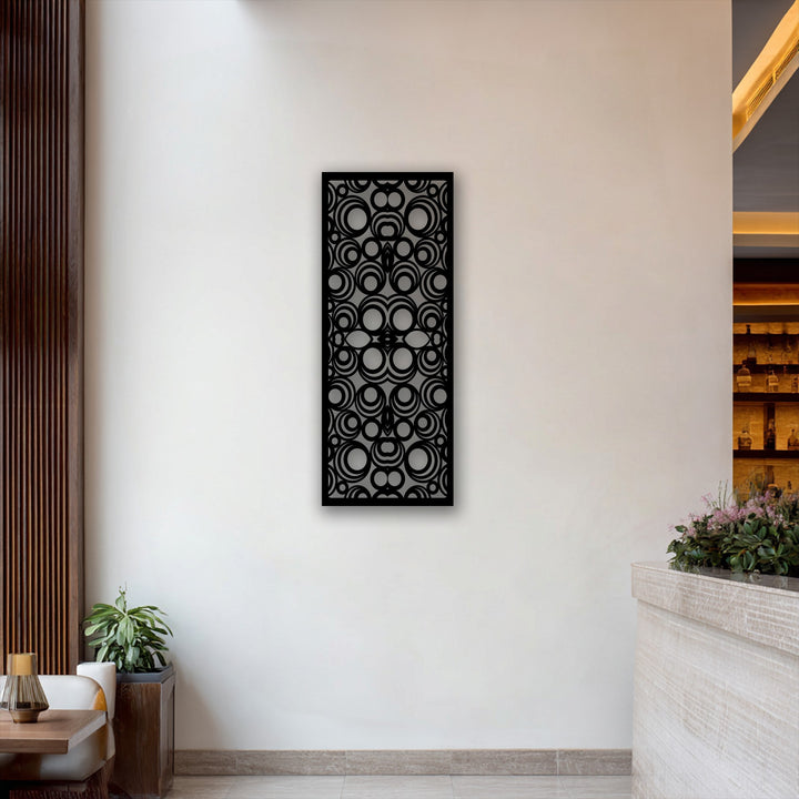 The invitingly warm color temperature highlights the geometric circle pattern metal wall art, a modern decoration wall art panel.