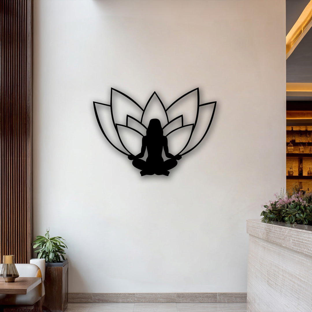 The serene negative space of the white wall perfectly outlines the black lotus meditation silhouette, forming a striking piece of decoration wall art.