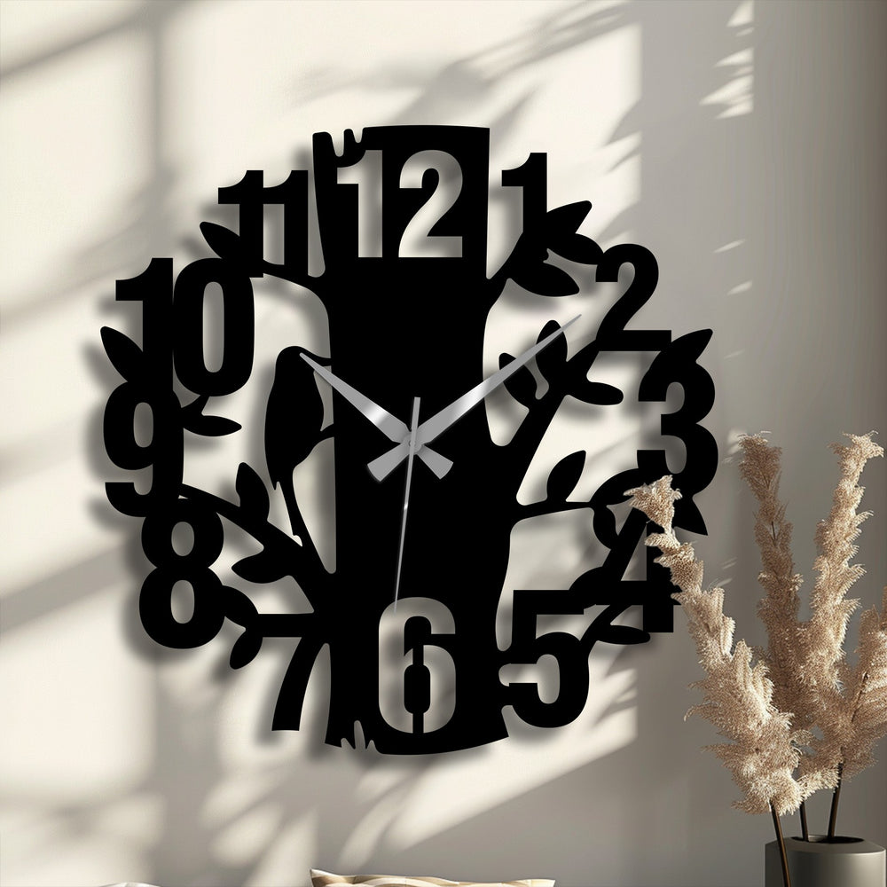 Negative space creates a captivating tree silhouette with bold numbers in this nature-inspired metal decoration wall art clock, offering a modern, artistic touch.