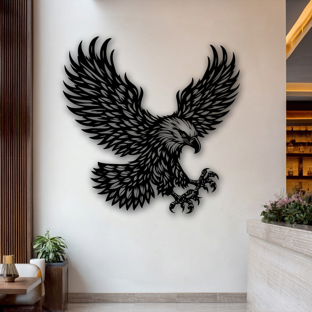 The low color saturation in this metal wall decor emphasizes the stark black silhouette of a majestic eagle with wings spread.